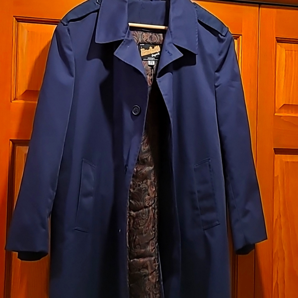 - Women's lined coat..size 38..Made in Montreal